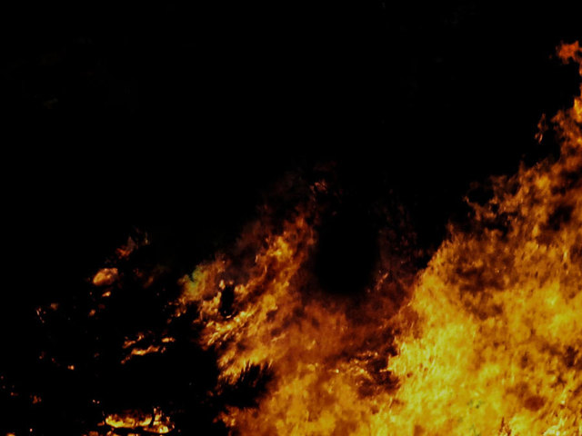 Officials: Pole melted by brush fire falls on Florida road