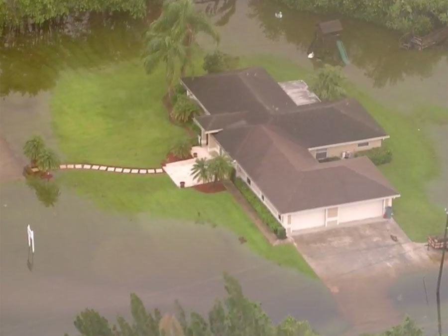 Heavy rain floods neighborhoods in Jupiter Farms