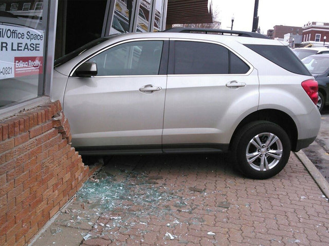 Teen accidentally plows into building during driving test Teen accidentally plows into building during driving test