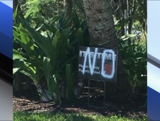 Sign promoting local teacher pay raises defaced